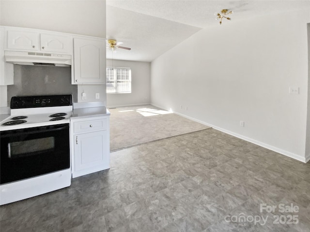 kitchen featuring electric stove, white cabinetry, and ceiling fan