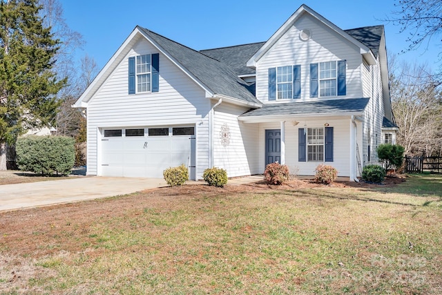 view of front property with a garage and a front lawn