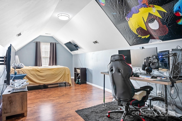 office with lofted ceiling and wood-type flooring