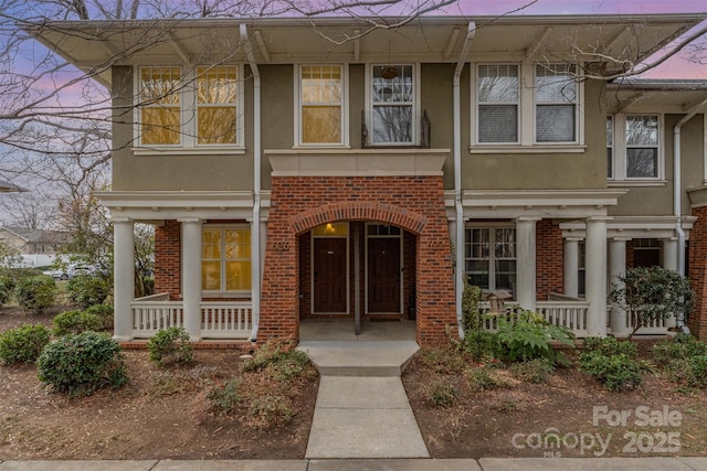 view of front of home featuring covered porch