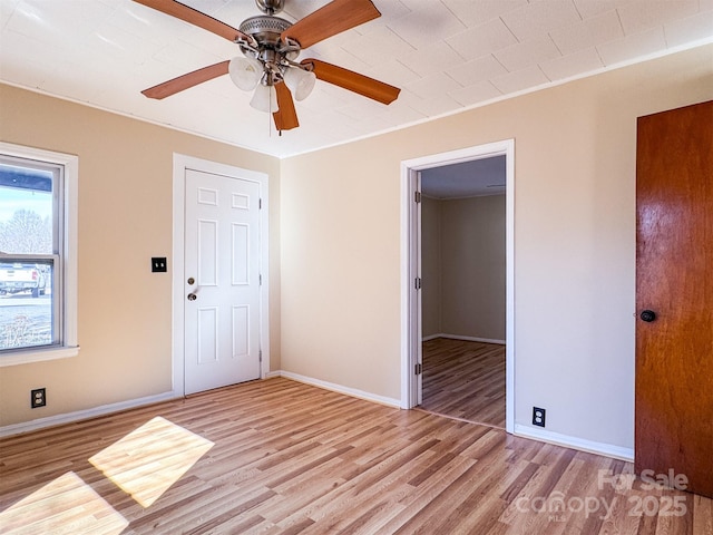 unfurnished bedroom with light hardwood / wood-style floors and ceiling fan