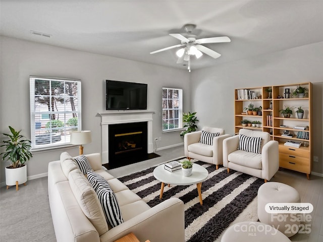 living room with ceiling fan