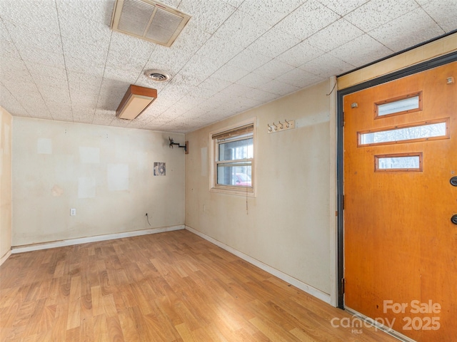 foyer entrance featuring light hardwood / wood-style flooring