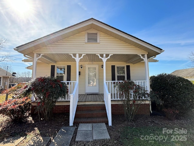 bungalow-style home featuring covered porch