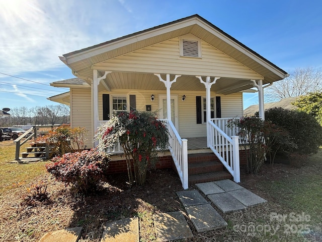 bungalow-style home featuring covered porch