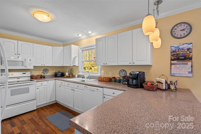 kitchen featuring white cabinetry, white appliances, sink, and hanging light fixtures