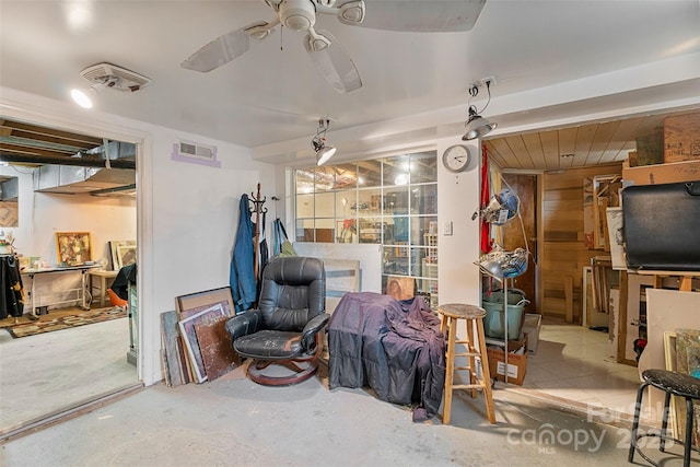 interior space featuring ceiling fan