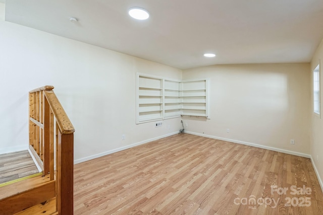 unfurnished room featuring light hardwood / wood-style flooring