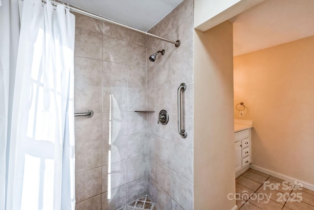 bathroom featuring vanity, tile patterned floors, and a shower with shower curtain