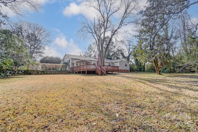 view of yard featuring a deck