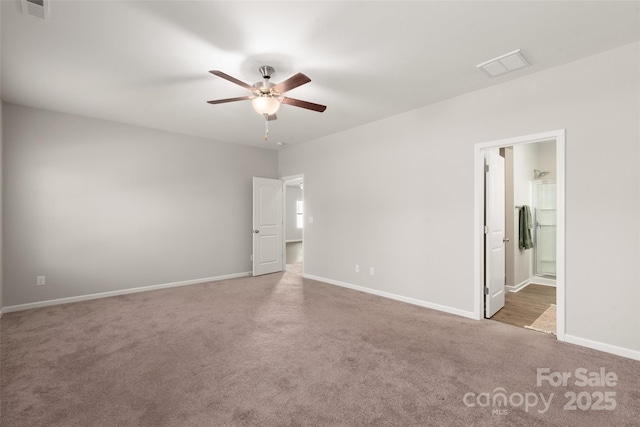 unfurnished room with ceiling fan and carpet floors