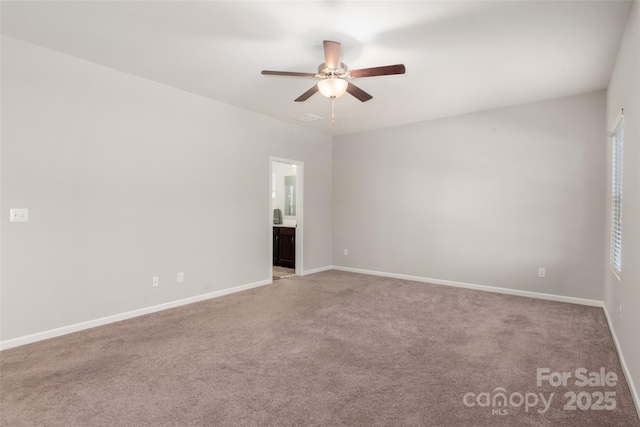 empty room with light carpet and ceiling fan