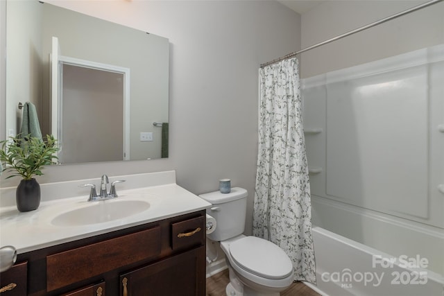 full bathroom with vanity, shower / bathtub combination with curtain, and toilet