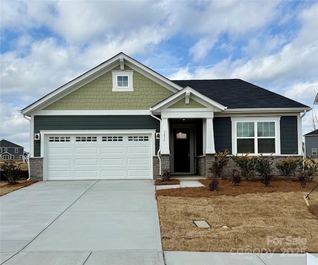 craftsman-style house featuring a garage