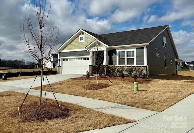 craftsman inspired home with a garage