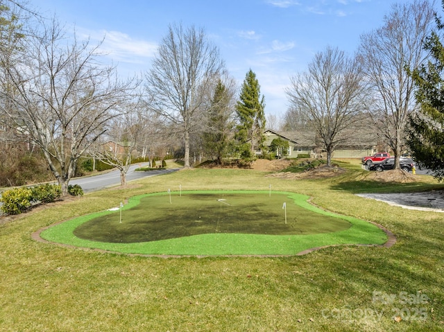 view of community featuring a lawn