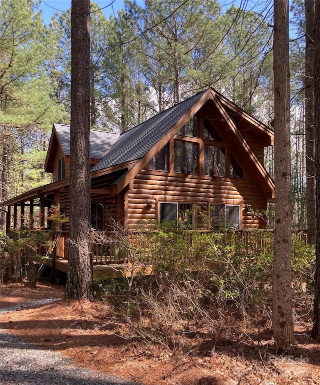 view of home's exterior featuring a shingled roof