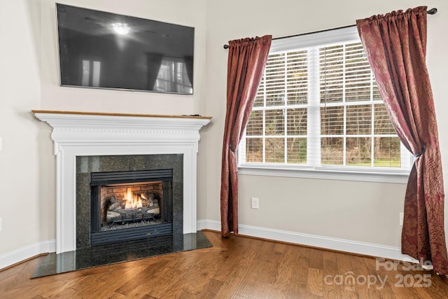 interior details with hardwood / wood-style flooring