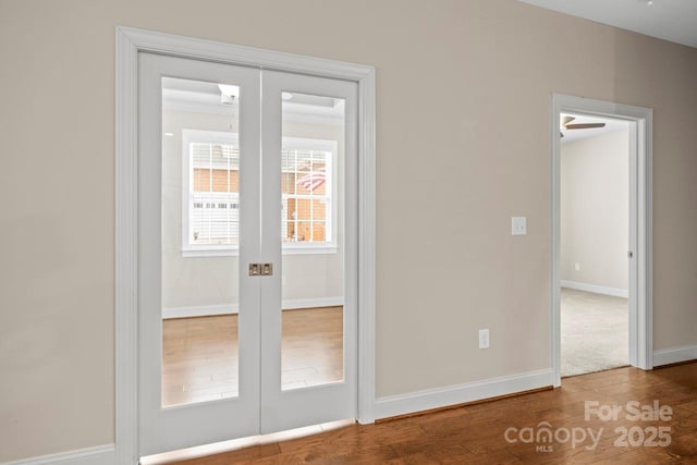 doorway to outside featuring wood-type flooring and french doors