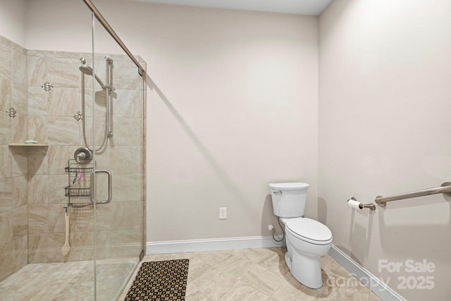 bathroom with toilet and walk in shower