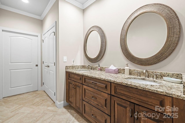 bathroom featuring vanity and crown molding