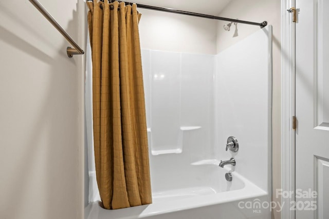 bathroom featuring shower / bath combination with curtain