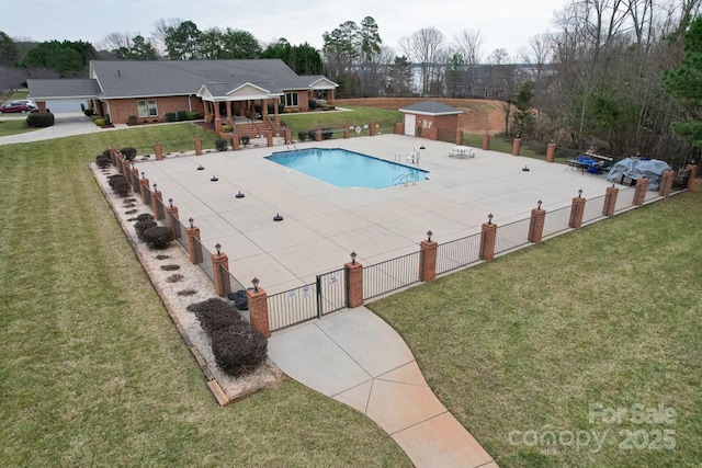 view of pool featuring a gazebo, a storage shed, a patio area, and a lawn