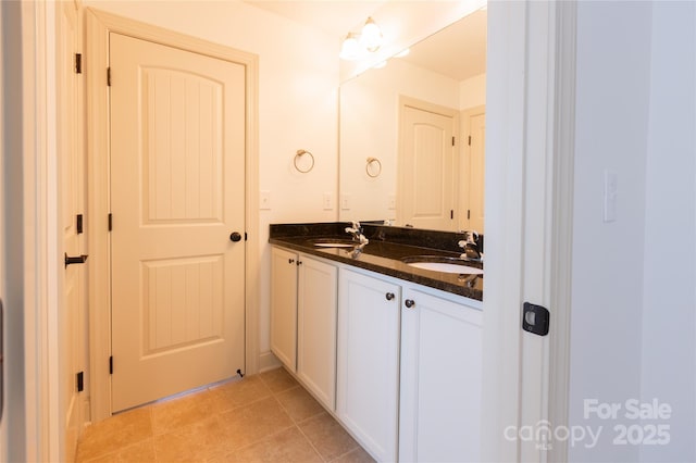 bathroom featuring vanity and tile patterned floors