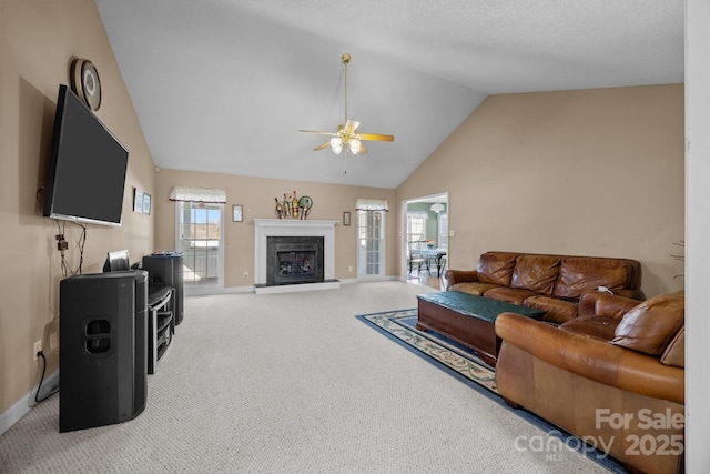 living room with ceiling fan, carpet flooring, and high vaulted ceiling