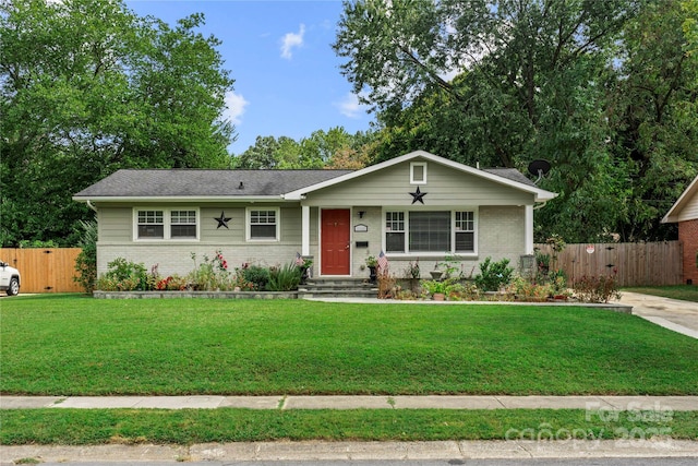 single story home with a front yard