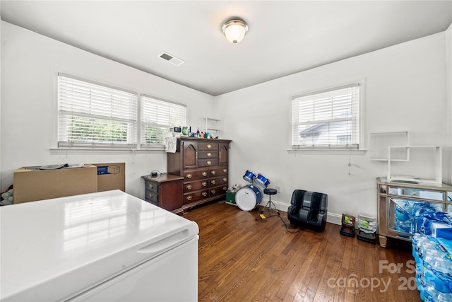 washroom with dark hardwood / wood-style floors