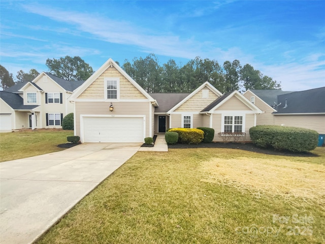 view of front of property with a garage and a front lawn