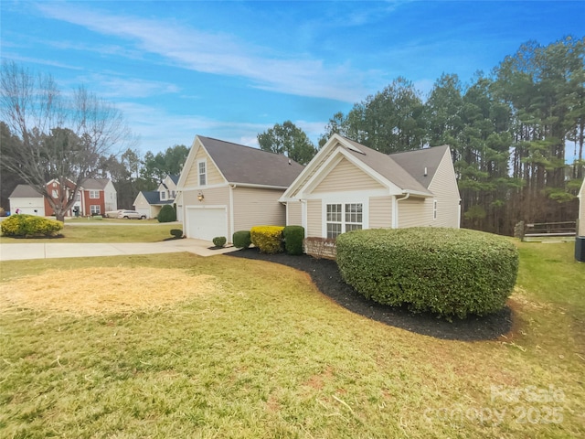 view of home's exterior featuring a garage and a lawn