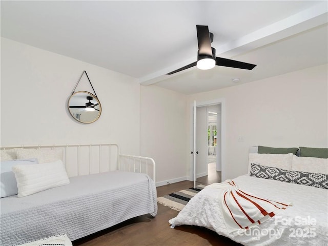 bedroom with dark wood-type flooring and ceiling fan