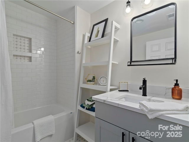 bathroom with vanity and shower / bath combo with shower curtain