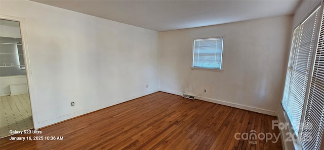 unfurnished bedroom featuring wood-type flooring