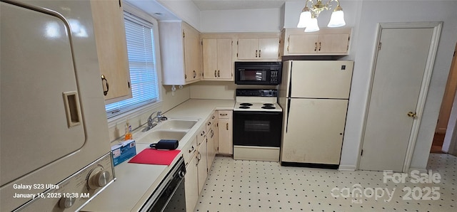 kitchen featuring sink and black appliances