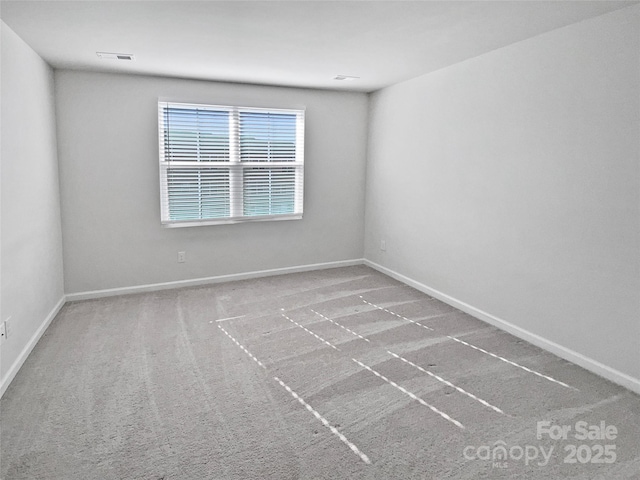 view of carpeted spare room