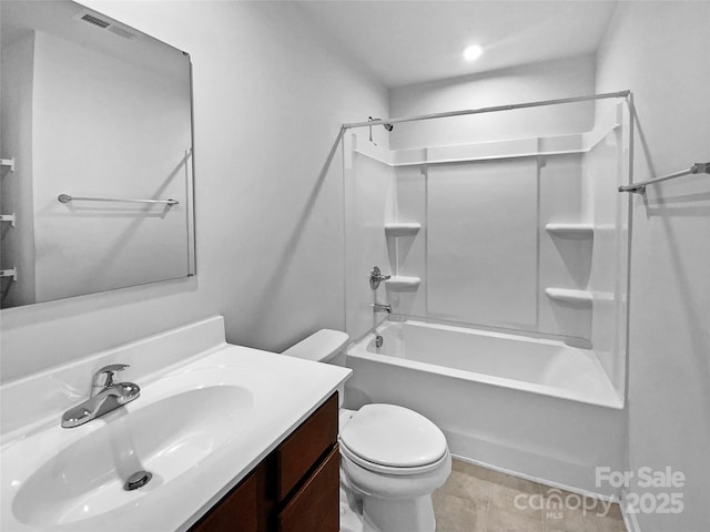 full bathroom featuring tile patterned flooring, bathing tub / shower combination, vanity, and toilet