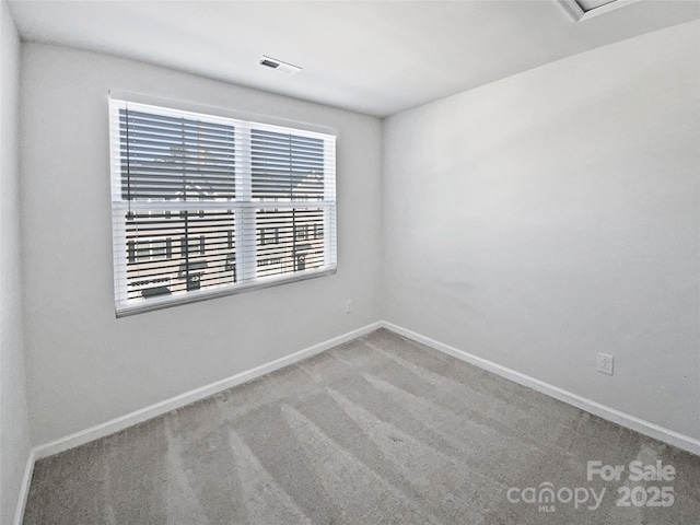 view of carpeted spare room