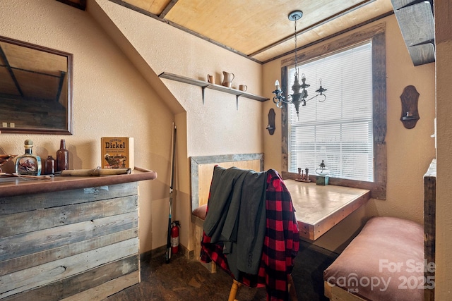 bathroom featuring a notable chandelier