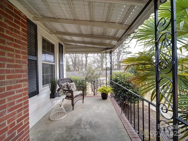 balcony featuring covered porch