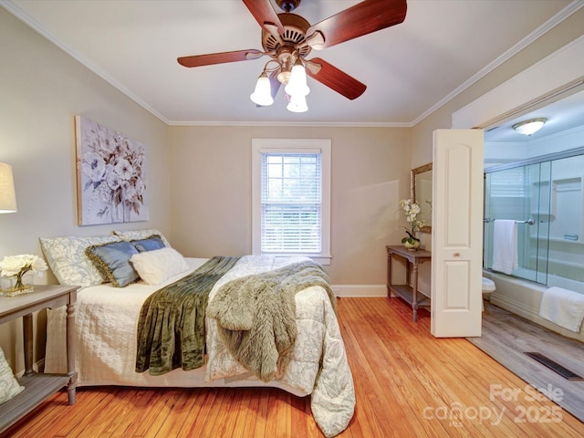 bedroom featuring crown molding, ceiling fan, and light hardwood / wood-style flooring