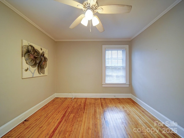 spare room with crown molding, ceiling fan, and light hardwood / wood-style floors