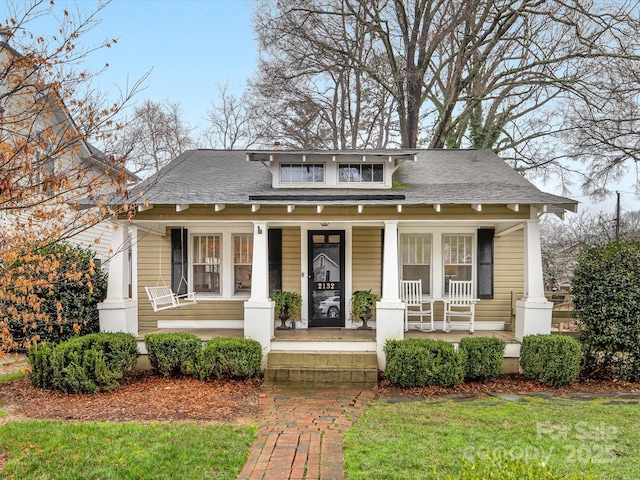 bungalow-style house featuring covered porch