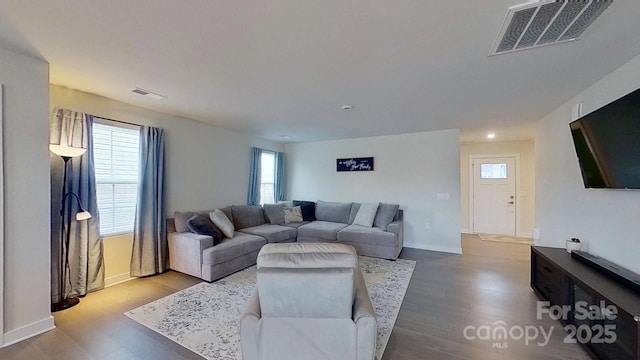 living room with light hardwood / wood-style floors