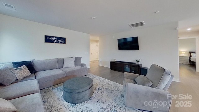 living room with hardwood / wood-style floors