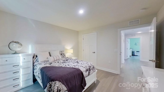 bedroom featuring light hardwood / wood-style flooring