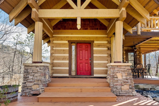 doorway to property with a porch