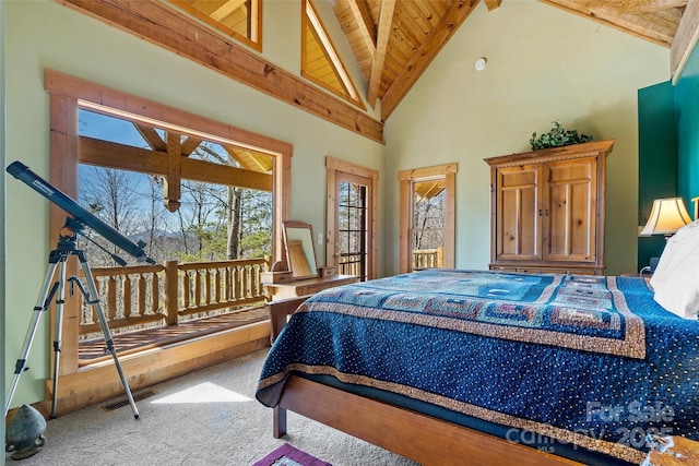 bedroom with carpet, high vaulted ceiling, and beam ceiling